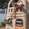 imageStep2 Naturally Playful Adventure Lodge Play Center with Glider Kids Outdoor Playset Two Tier Backyard Playground Set Slide Swings Outside Jungle Gym For Children 38 Years Old
