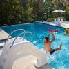 imageStep2 Vero Pool Slide OutdoorIndoor Waterproof Patio Furniture NonSlip Steps Hose Attachment Made of Durable Plastic 4 Feet White